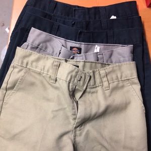 5 pairs of dickies size 8 boys shorts.  3 navy, 1 grey, w khaki